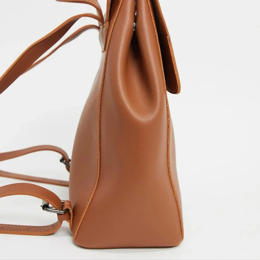 Claudia Canova Unlined Flapover Backpack Tan Faux Leather Minimalist